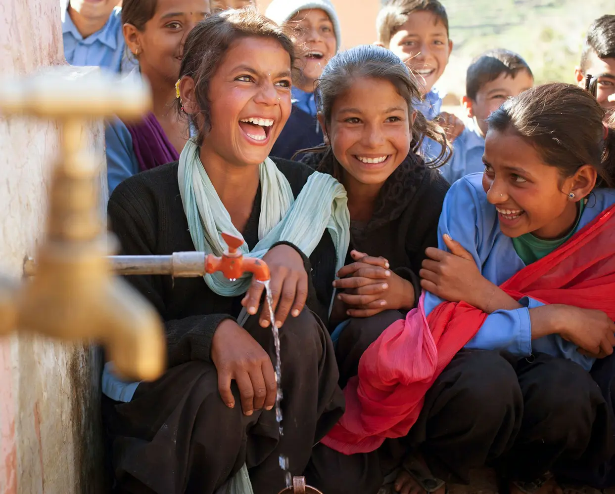 children enjoying clean water